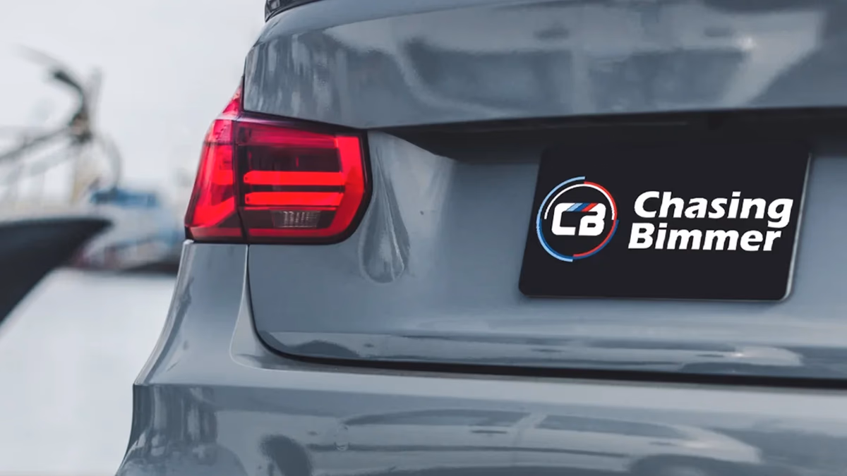 Chasing Bimmer brand identity designed by Desque, primary logo on dark branded panel