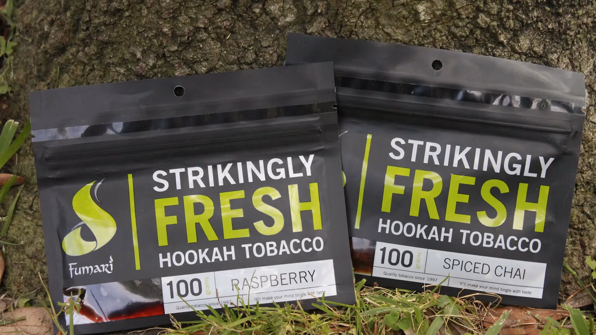 Mint Crate curated hookah tobacco product photography featuring Fumari packaging designed for the brand launch