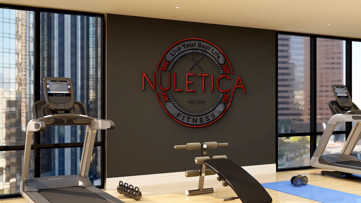 Nuletica Fitness logo displayed on gym wall, brand identity designed by Desque