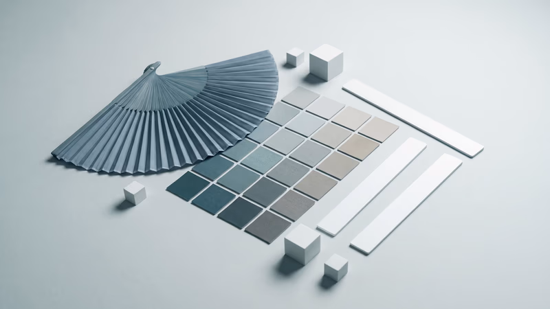 Unlabeled color swatch chips in a teal-to-neutral gradient arranged alongside blank spacing ruler sticks, representing design tokens and visual design variables