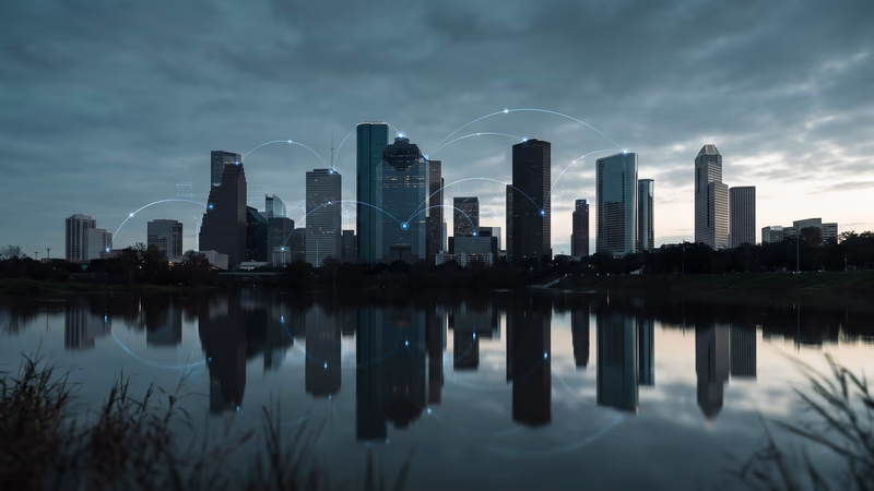 Houston downtown skyline at dusk with subtle abstract connectivity light traces representing digital marketing channels for local businesses