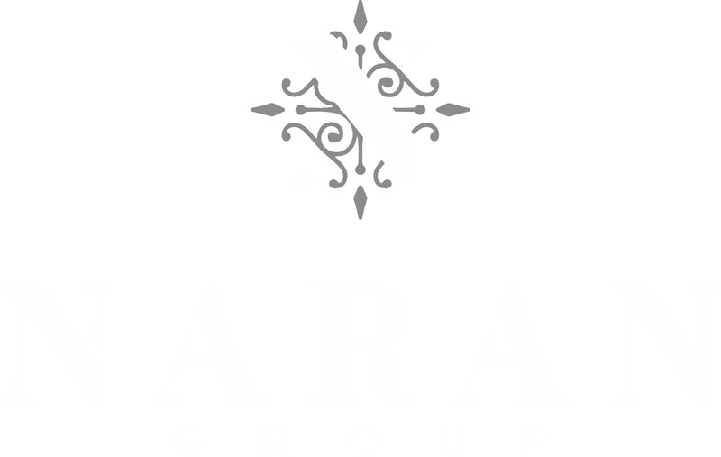 Naran Group reverse light logo on dark background designed by Desque