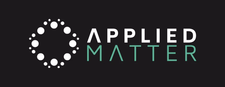 Applied Matter reverse white logo on dark background designed by Desque