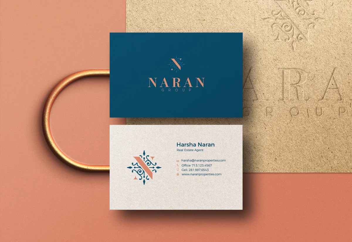 Naran Group business card mockup in hand, designed by Desque