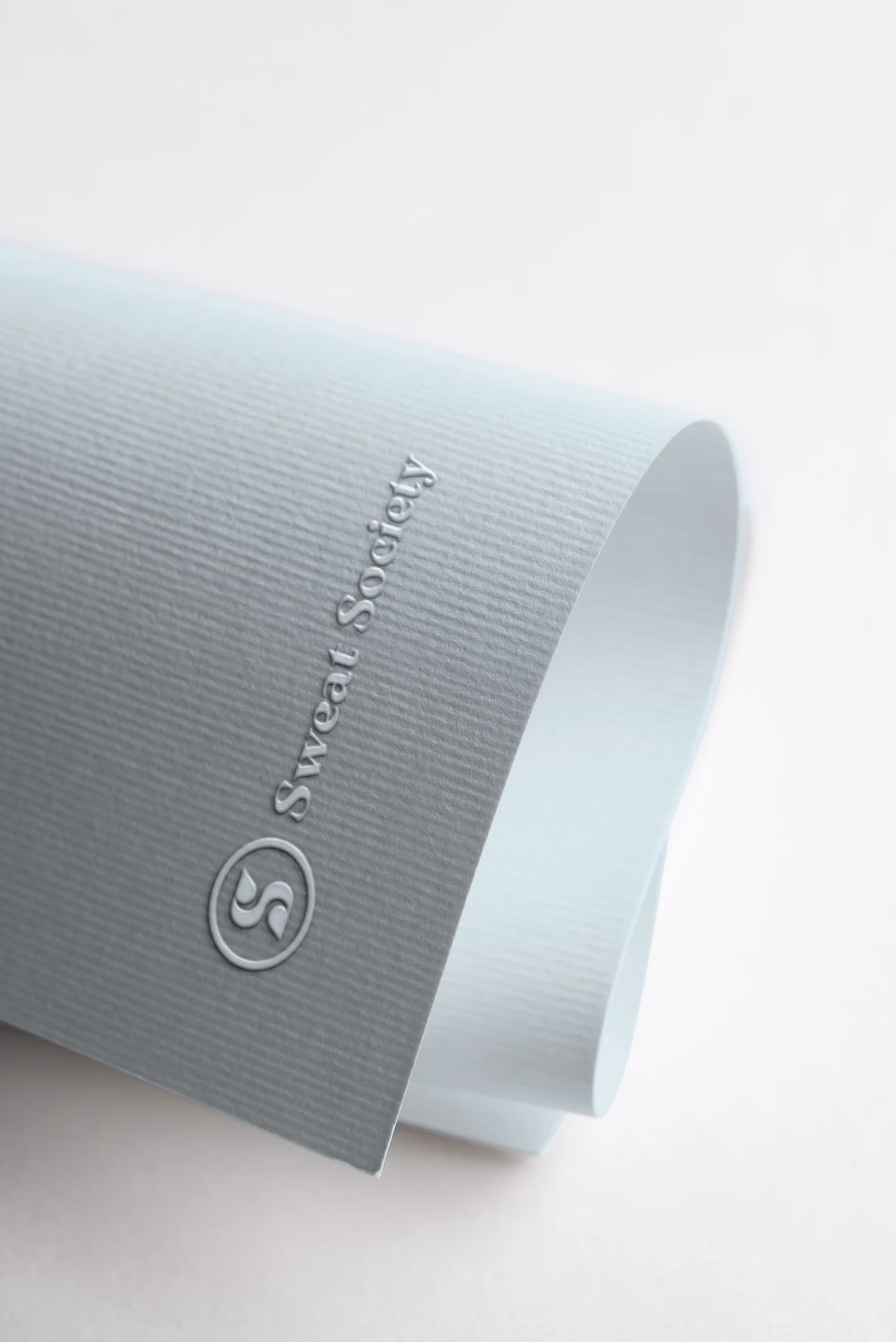 Sweat Social branded yoga mat mockup designed by Desque