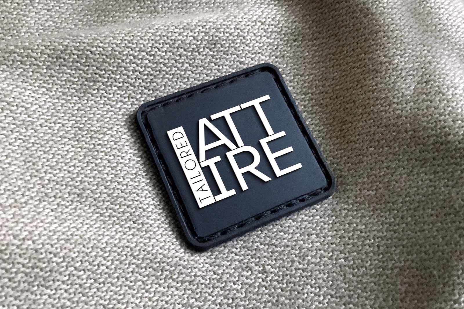 Tailored Attire clothing tag mockup designed by Desque, illustrating interior label and woven label use