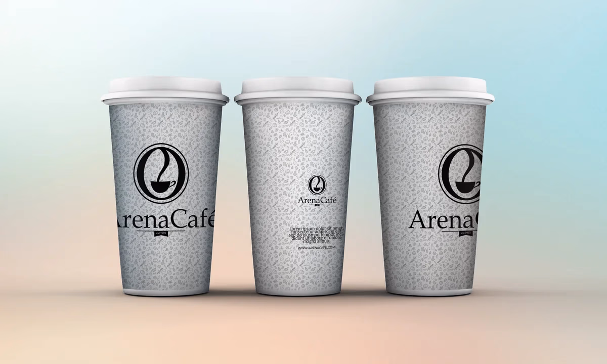 Arena Cafe branded coffee cup mockup designed by Desque
