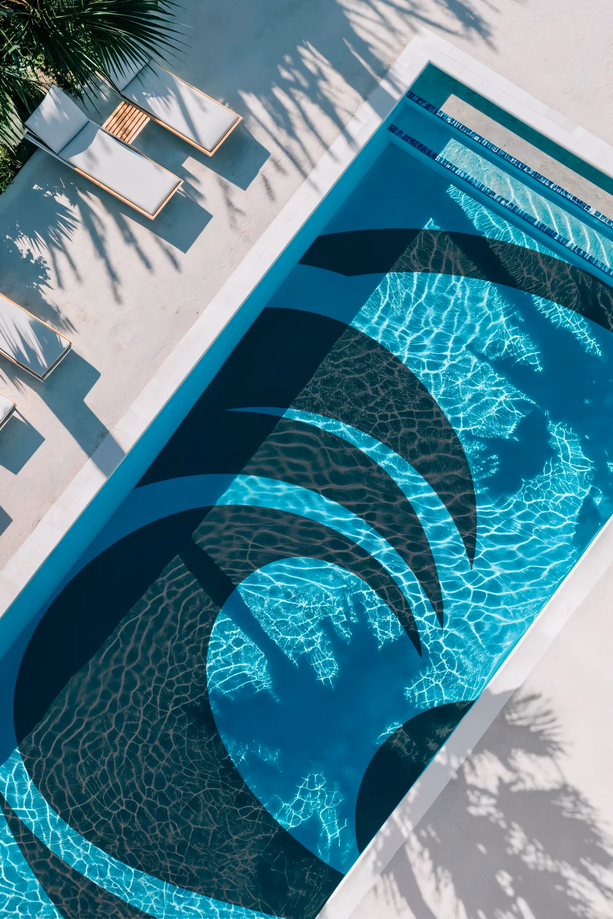 Costa Custom Pools poolside environmental branding designed by Desque