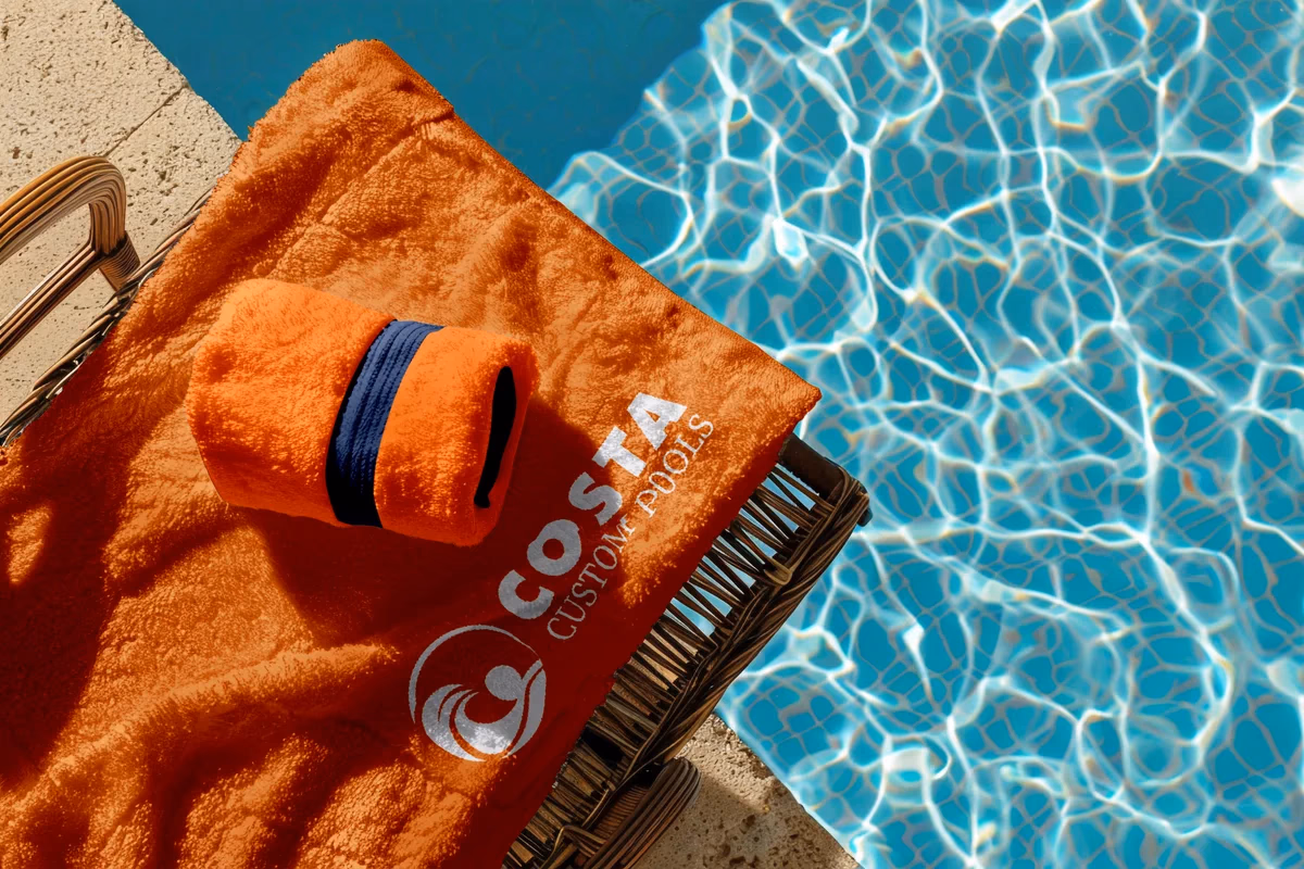 Costa Custom Pools branded towel merchandise designed by Desque