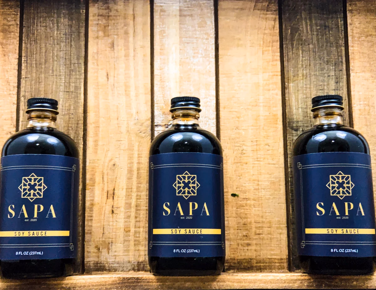 Sapa and Co sweet soy sauce bottles flat lay product photograph for Desque