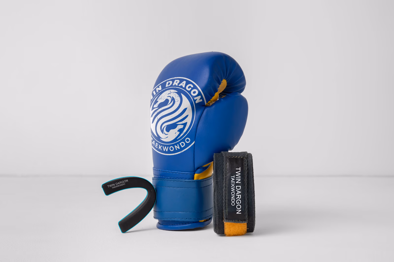 Twin Dragon Taekwondo full branded apparel and equipment set designed by Desque