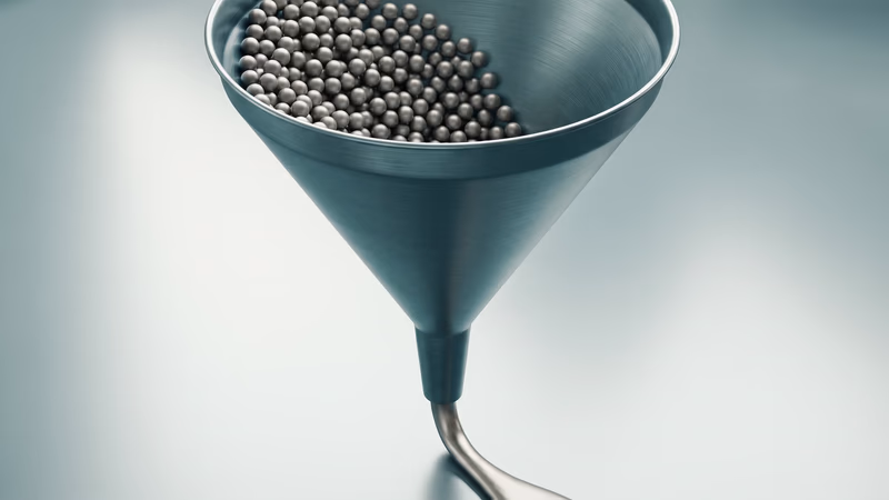 Industrial metal funnel with small spheres flowing from wide opening to narrow spout, representing website conversion tracking and lead funnel analytics